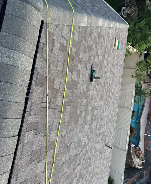 Finished repair area blending into the existing roof in Pearland, TX
