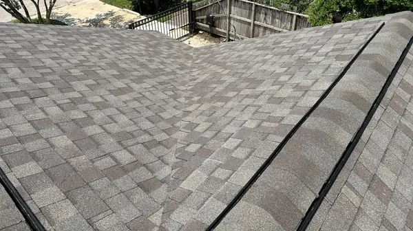 Rear slope of a new shingle roof in Houston 77008