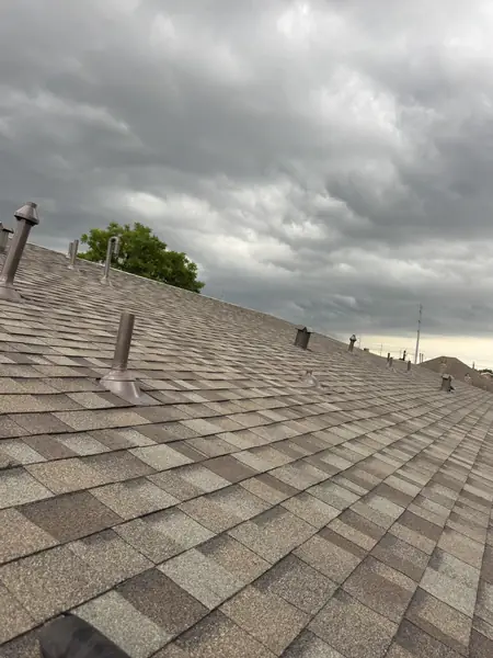 Finished slope under a storm front the afternoon the roof was completed