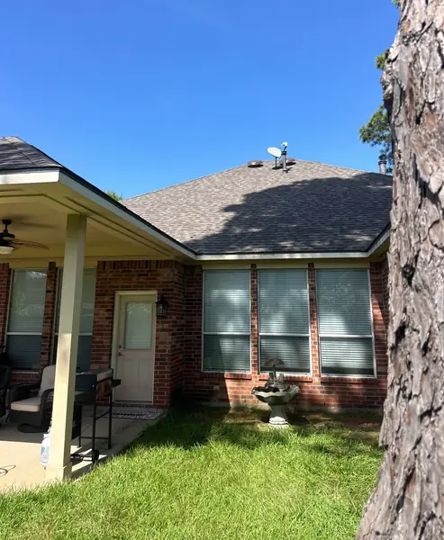 Rear elevation showing the new roof over the covered patio