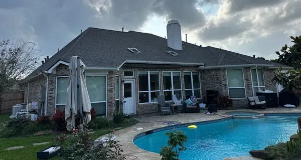 Brick chimney on a replaced roof in Pearland