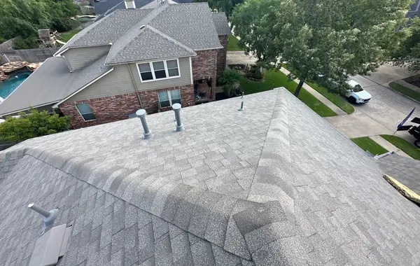 Rooftop view over the front slope toward the street