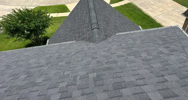 Hip ridge and dormer detail on a June 2025 roof replacement in Houston, TX