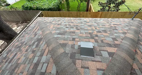 Close view of Aged Copper laminate shingles in Quail Valley