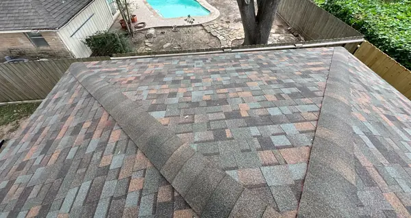 Hip ridge of a November 2024 roof replacement in Missouri City, TX