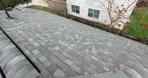 Rear hip of the completed roof above the back yard