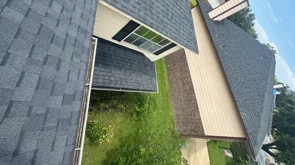 Hip ridge of an August 2024 roof replacement in southwest Houston