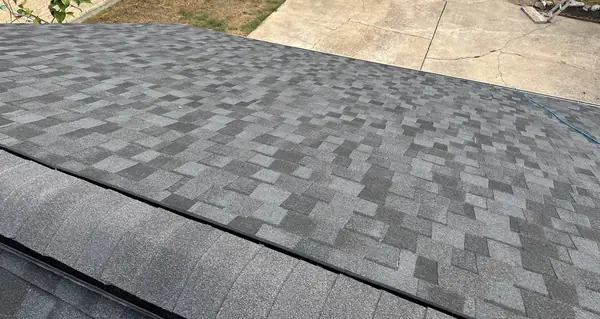 Hip ridge line on a replaced roof in Bear Creek, Houston