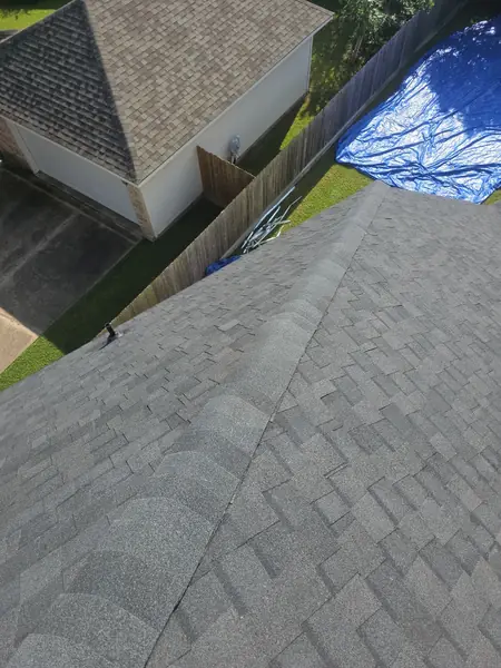 Brick chimney re-flashed on a new League City, TX roof
