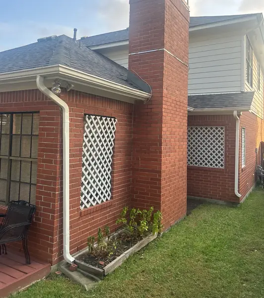 Side elevation of a Clear Lake home after roof replacement