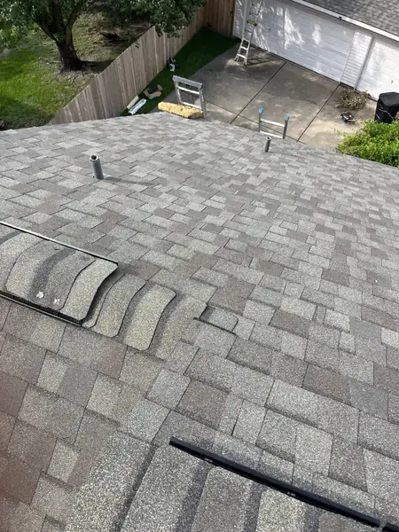 Hip ridge of an August 2025 roof replacement in Clear Lake