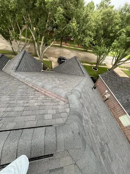 Hip and gable ridges on a June 2025 roof replacement in Copperfield