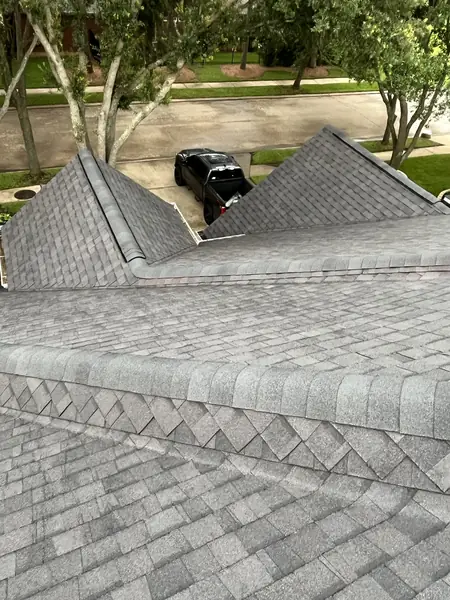 Side slope of a replaced roof looking toward the street in 77095