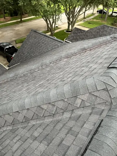 New ridge cap and hip lines on a one-story Houston home