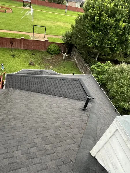 Replaced roof over the fenced backyard of a Copperfield house