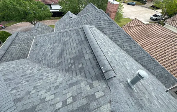 Main ridge with new ridge cap and exhaust vent