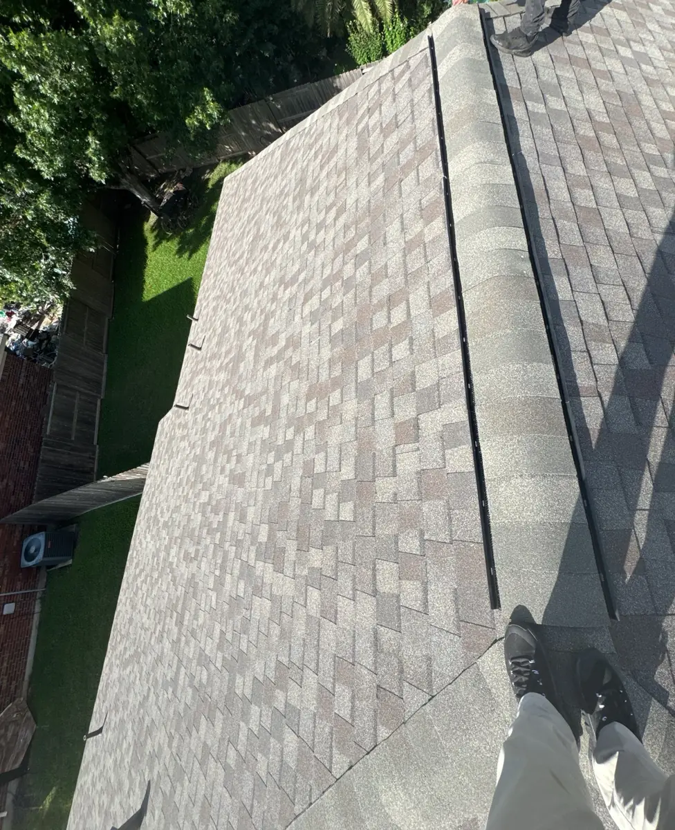 New Weathered Wood shingle roof on a two-story Houston home in 77064