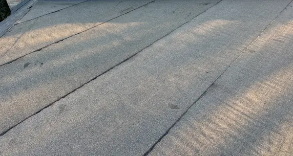 Re-roofed low-slope section with new membrane and edge metal