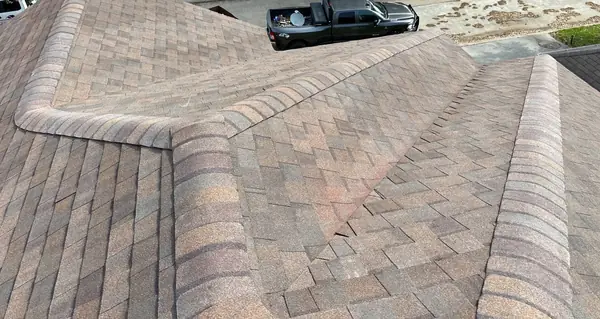 Shingle field and ridge after replacement, Cypress 77429