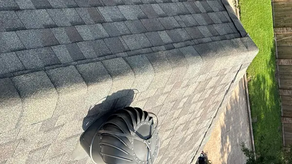 Ridge cap and valley detail on a new Houston roof