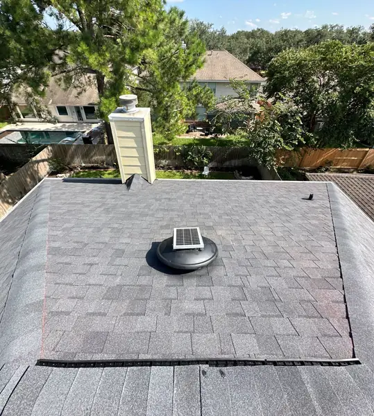 Solar attic fan re-set on a new laminate roof in Houston, TX