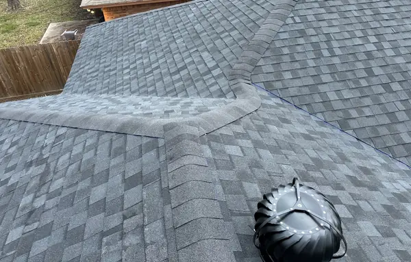 New turbine vent on a low-slope Houston roof