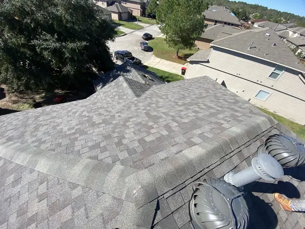 Front slope and ridge vent after replacement, Humble 77396