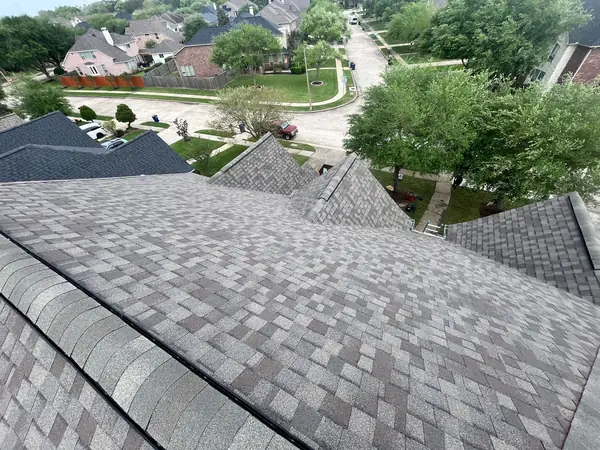Hip ridge of an April 2025 roof replacement in League City