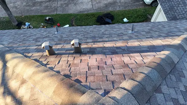 Hip ridge of a January 2025 roof replacement in Kingwood