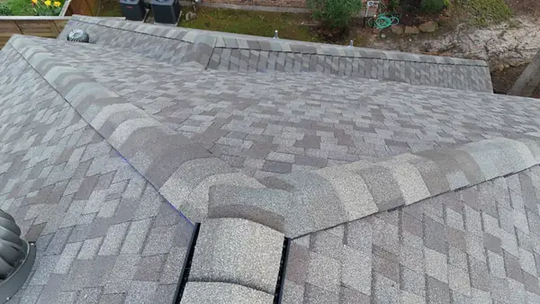 Valley and ridge detail on a replaced roof in Kingwood, TX