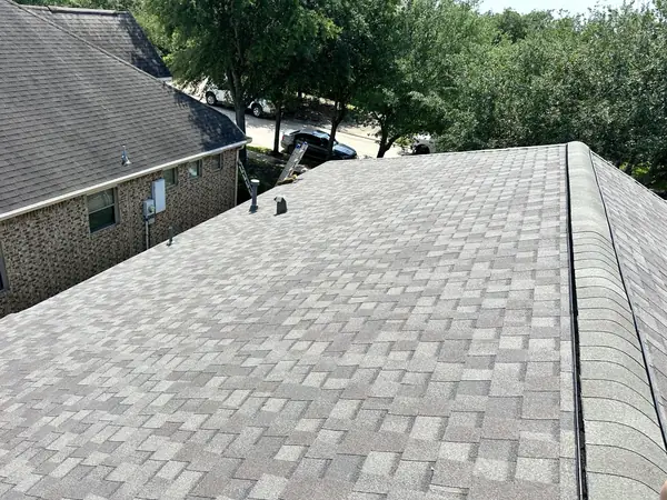 Rear slope of a new shingle roof in Houston 77047