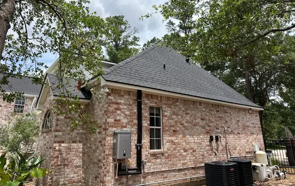 Side slope and garage roof with new shingles