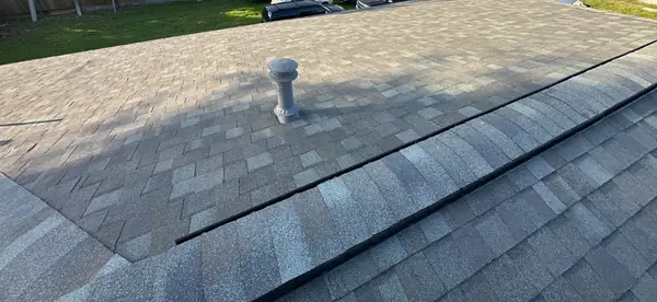 Carport roof re-shingled to match the house in Houston, TX