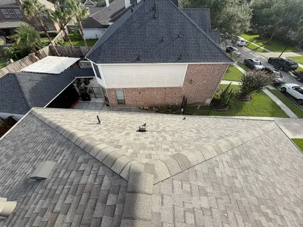 Rear of the house with the new roof and solar mounts