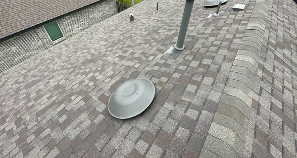 Ridge cap on a September 2025 roof replacement in Rosharon, TX