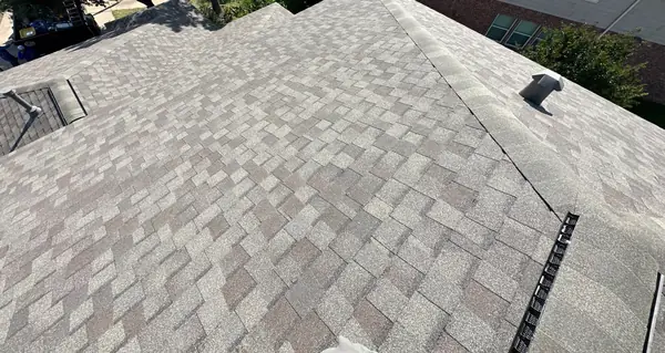 Shingle field and new pipe jack on the main slope