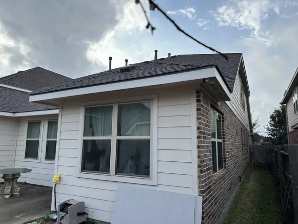 Rear elevation of a March 2024 roof replacement in Richmond, TX