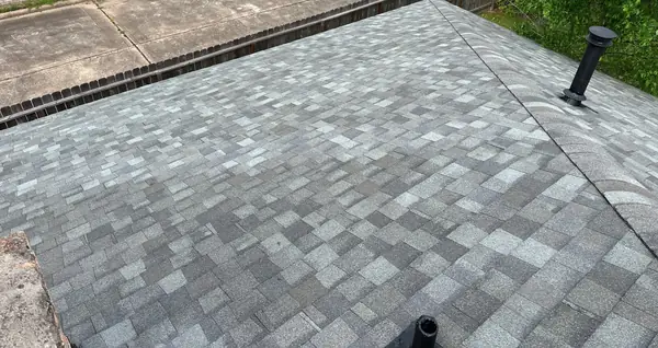 New pipe jacks and dome vent on a laminate shingle roof