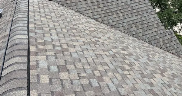 Ridge line of the completed roof above the street