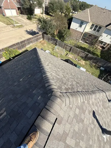 Rear hip and valley of the completed roof, Cypress 77429