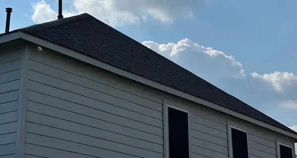 Front gable with fresh shingles in Houston 77049