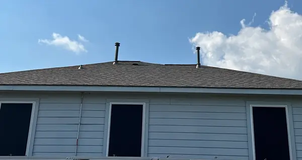 Solar mounts re-set on a new shingle roof in Houston, TX