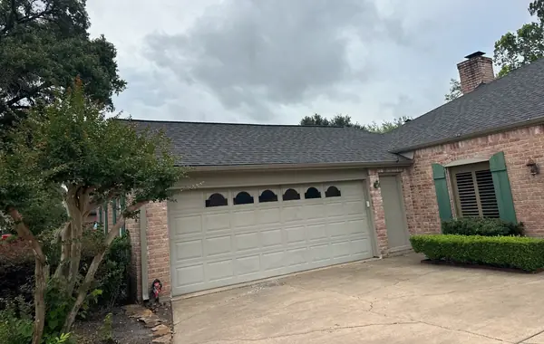 Front of a Missouri City home after a June 2026 roof replacement