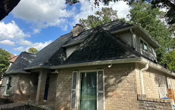 Side elevation showing the chimney and new flashing