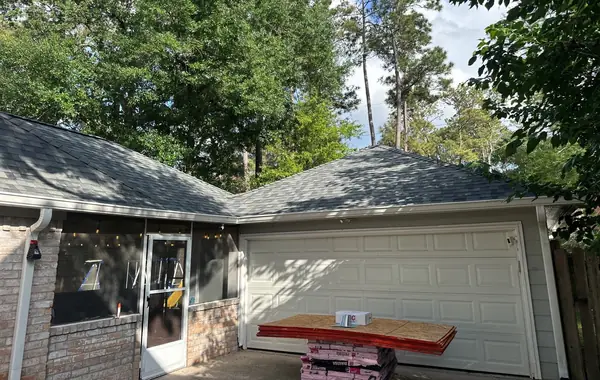 Rear patio cover with its new low-slope roof