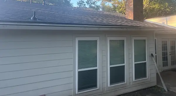 Rear windows under the new eave and gutters