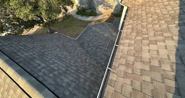 Hip and ridge caps of a new charcoal roof in Atascocita