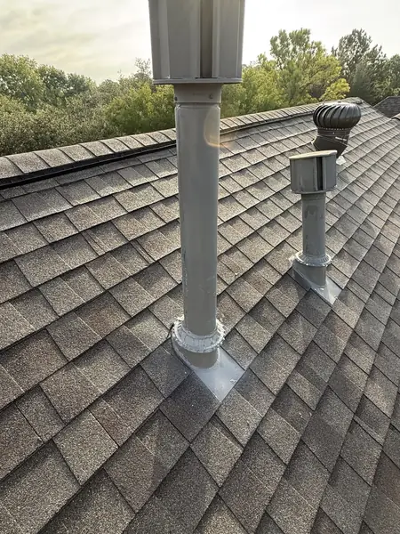 Old cracked pipe boots and turbine before roof replacement in Houston
