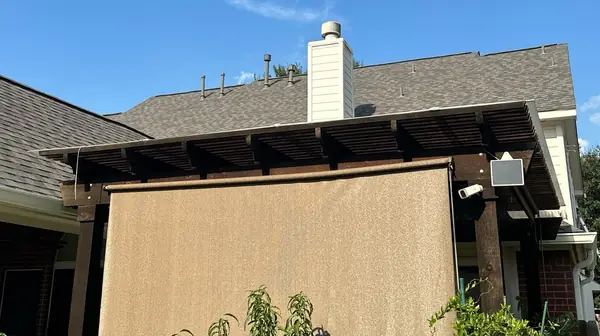 Patio cover roof replaced with new laminate shingles in Houston, TX