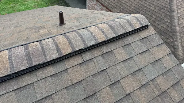 Brick chimney re-flashed on a new Houston roof
